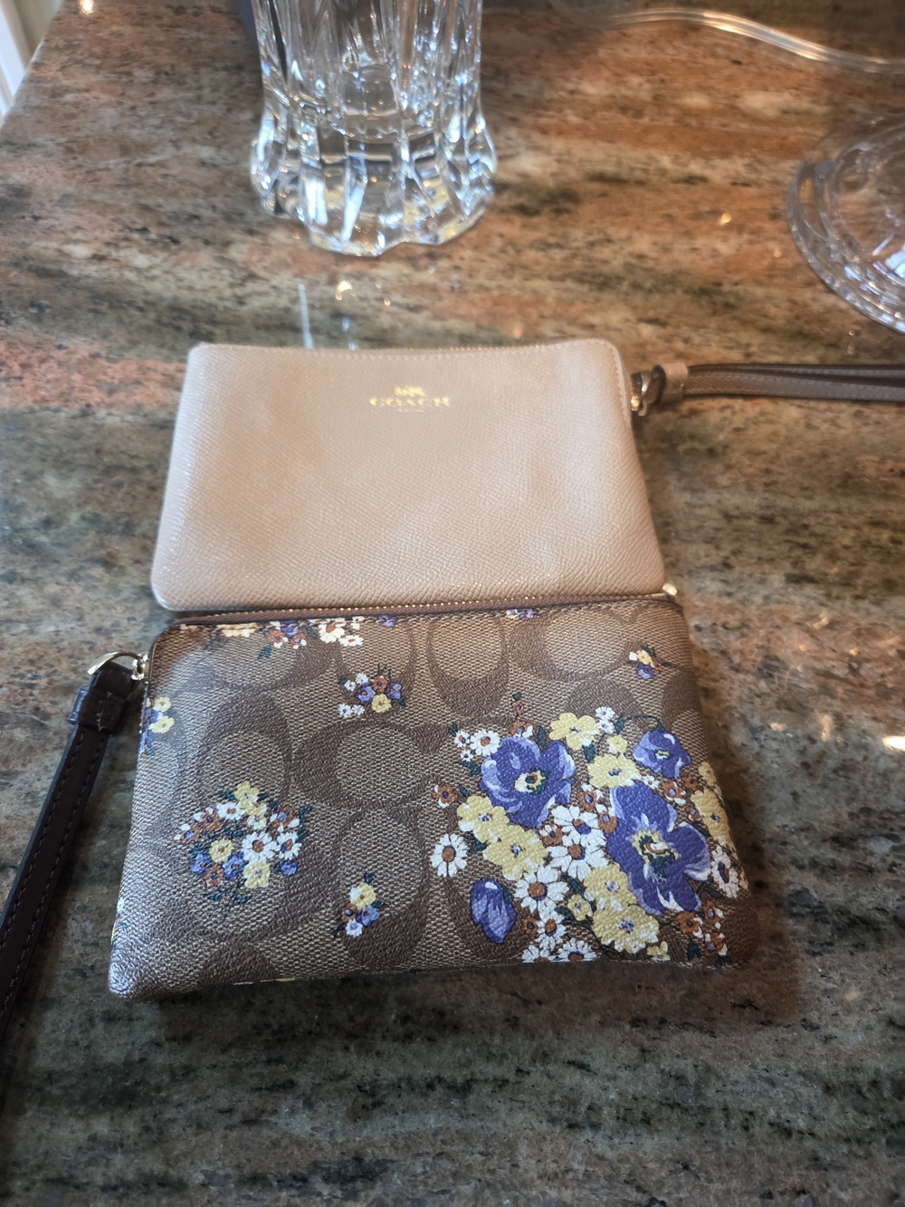 Two Coach Wristlets in Beige And Brown With Floral Pattern